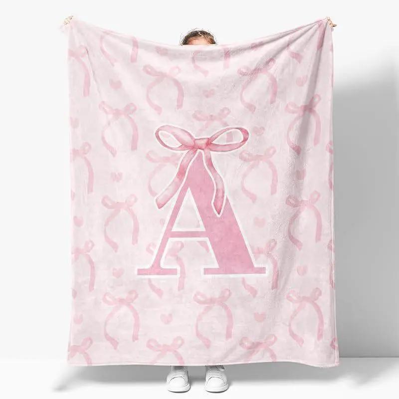 Personalized Pink Ribbon Initial Flannel Blanket — ultra-soft baby keepsake with custom name; first-year memory blanket ideal nursery decor and heirloom gift for newborns