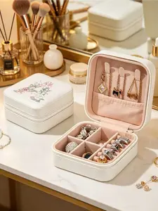 White mini jewelry box with dried flower & letter print. Compact and portable, perfect for business trips and daily outings. Ideal for storing rings, pendants, earrings, necklaces and bracelets. A delicate gift for women.