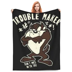 Retro-style flannel blanket with a cartoon Tasmanian devil Taz print. Soft, warm, and durable, suitable for home or holiday parties. 60*50