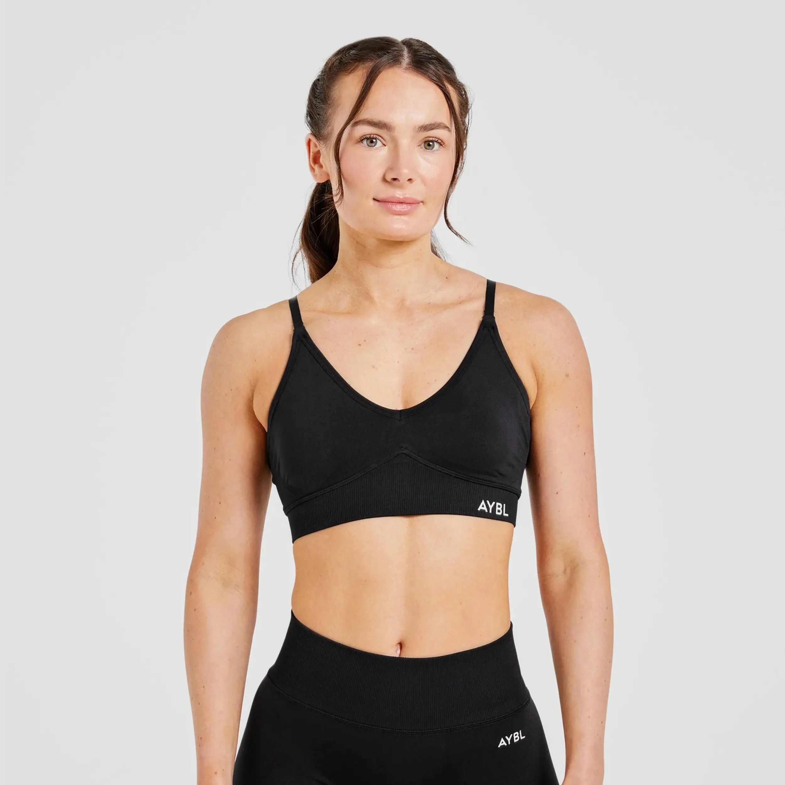 AYBL Adapt Seamless Sports Bra with V-Shaped Waistband & Adjustable Straps for Customizable Fit and Optimal Support