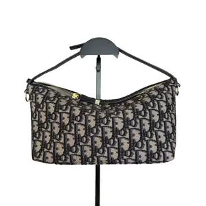 Pre-owned Dior Canvas Mini Bags Travel Nomad Pouch Oblique DR560