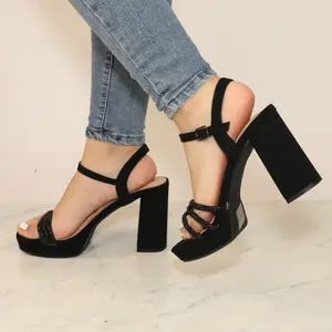 Lady high heel open toe, rhinestone embellished straps over the toe, round toe, tall block heel, and ankle strap with buckle