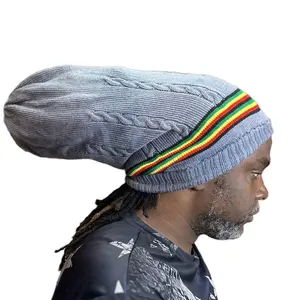 Grey hand knitted hat with rasta color stripes