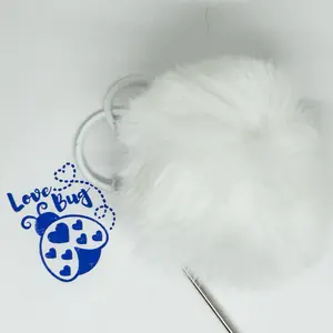 Beadable bar keychain with matching Pom Pom.