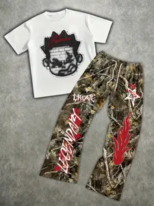 Perfect for everyday casual wear, this men's short-sleeve T-shirt and camouflage wide-leg pants set features a relaxed, breathable fit. It showcases a brick-wall graffiti cartoon portrait print, embodying an American street-style vibe