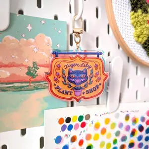 Derpy Tiger – Plant Shop Sign – Iridescent Acrylic Keychain | K-Pop Movie Character