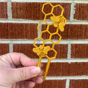 Bee and honeycomb plant trellis