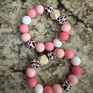 Pink western cow silicone wristlet keychain