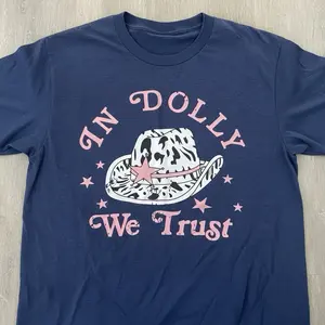 Dolly Tshirt - Women's Top with "In Dolly We Trust" Design, Blue Color , Casual Style, Perfect for Everyday Wear - Womenswear