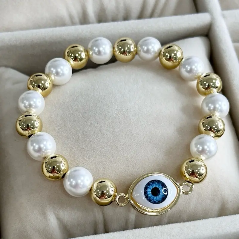 Pulsera elástica con ojo Gold Plated 14 k