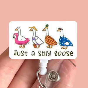Glitter My Badge Silly Goose badge reel for nurse and hospital workers. Serious Goose Badge clip Badge pull - Retractable swivel clip with a 360 rotation. Great gift for coworkers.