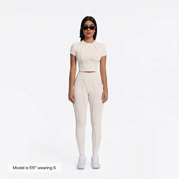 BetterMe Women's Contour Stitch Cropped Compression Top in Ivory – Breathable Fitted Fabric with Sculpted Fit for Gym & Everyday Womenswear, Shortsleeve, Tee, Spandex, Knit, Polyester, Tshirt, Soft, Gym Aesthetic