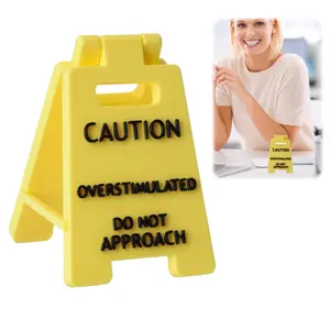 Caution Overstimulated Desk Sign - Yellow Sign with Black Text, Funny Joke Gift for Colleagues, Boss & Employees, Mini Novelty Desk Decoration