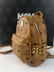 Pre-owned MCM Stark Mini Backpack with Studs