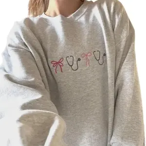 Embroidered Nurse Crewneck Sweatshirt, Stethoscope with Bow Design, Medical Uniform Gift, Cute Nursing Pullover