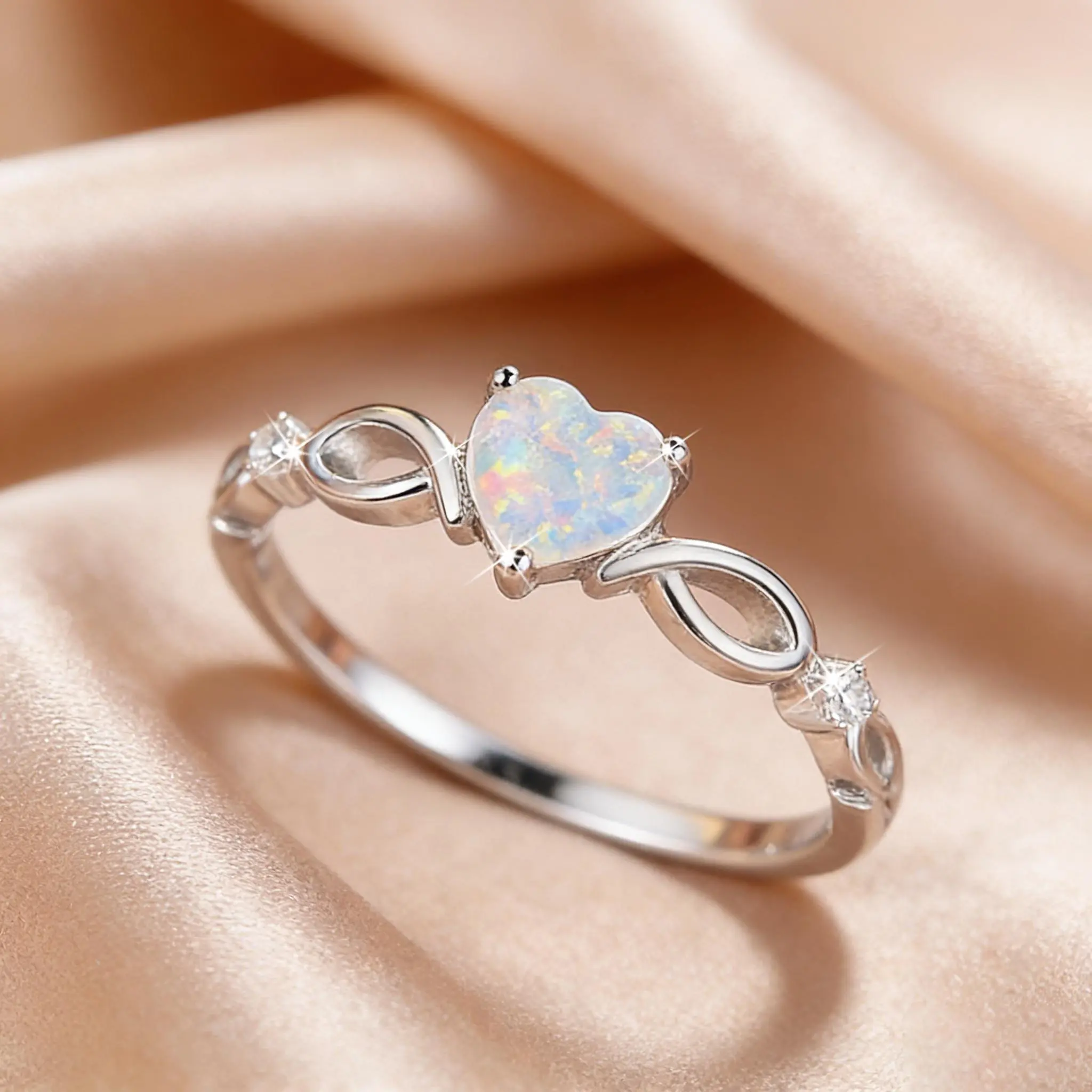 This heart-shaped synthetic ring, with an elegant and vibrant style, features an exquisite infinity symbol design, making it a perfect gift for women on Valentine's Day or anniversaries