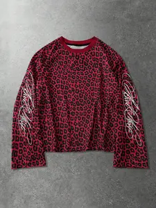 : Y2K Red Leopard Print Long Sleeve T-Shirt - Grunge Aesthetic Graphic Tee with Script Sleeve Detail - Oversized Streetwear Top for Bold Night Out and Rockcore Outfits