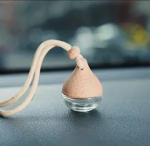 Car diffuser rear view mirror aromatherapy scent car air freshener essential oil bottle diffuser dangle for rooms, car accessories glass and wood bottle dangle pretty design teardrop bottle