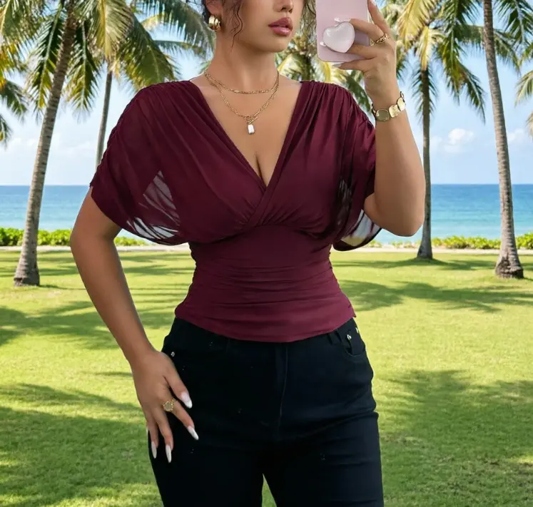 Women's Solid-Color Deep V-Neck Top: Featuring Flutter Sleeves, a Fitted Waist, and an Open Back with Tie-Back Detail—A Trendy, Flattering Style.