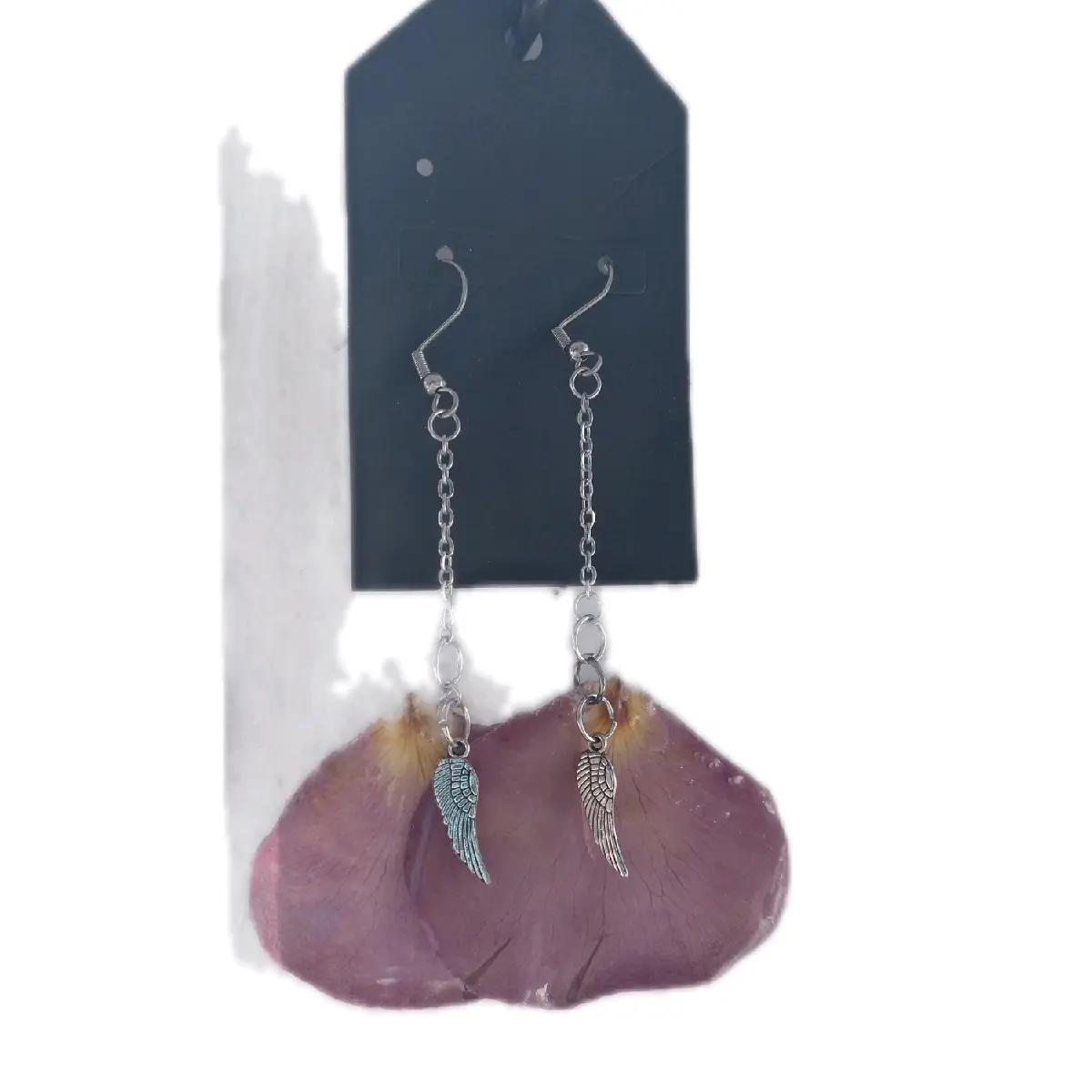 Personalized Cremation Earrings made using pressed friend flowers from Loved ones celebration of life/funeral