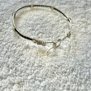 Silver and black wire wrapped bracelet