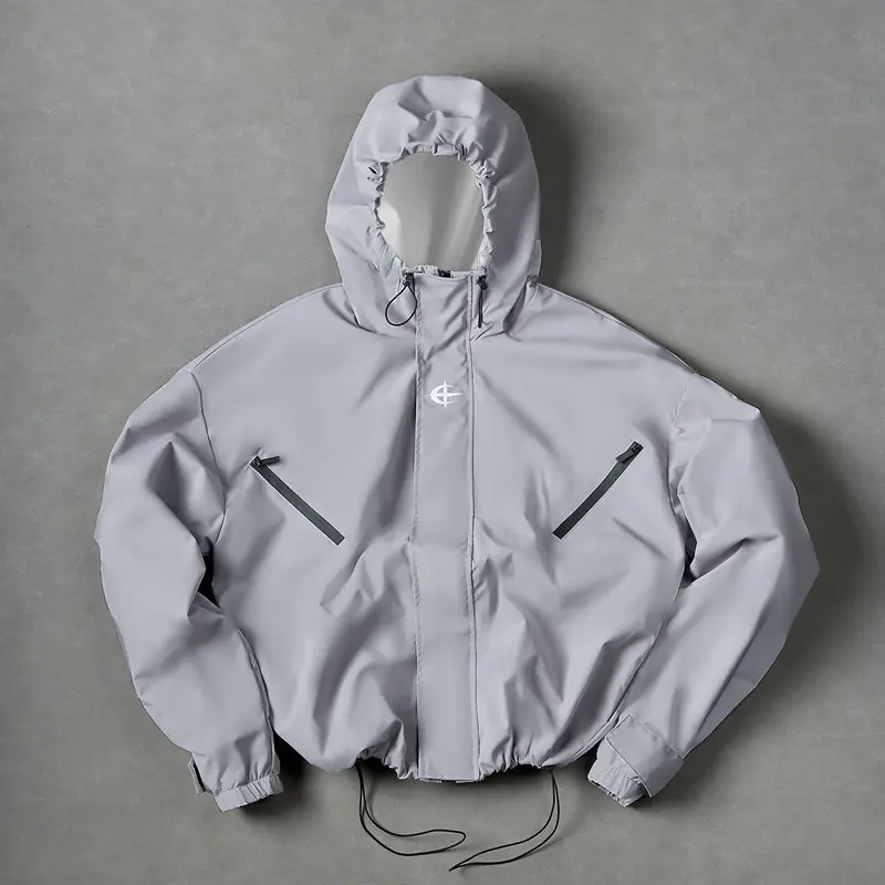 Men’s lightweight street-style windproof hooded jacket with an adjustable drawstring hem, suitable for everyday commuting, hip-hop streetwear, jogging, travel, and other outdoor activities—an essential fashion piece in any man’s wardrobe.