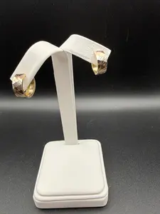 10K Huggies Earring in Three gold