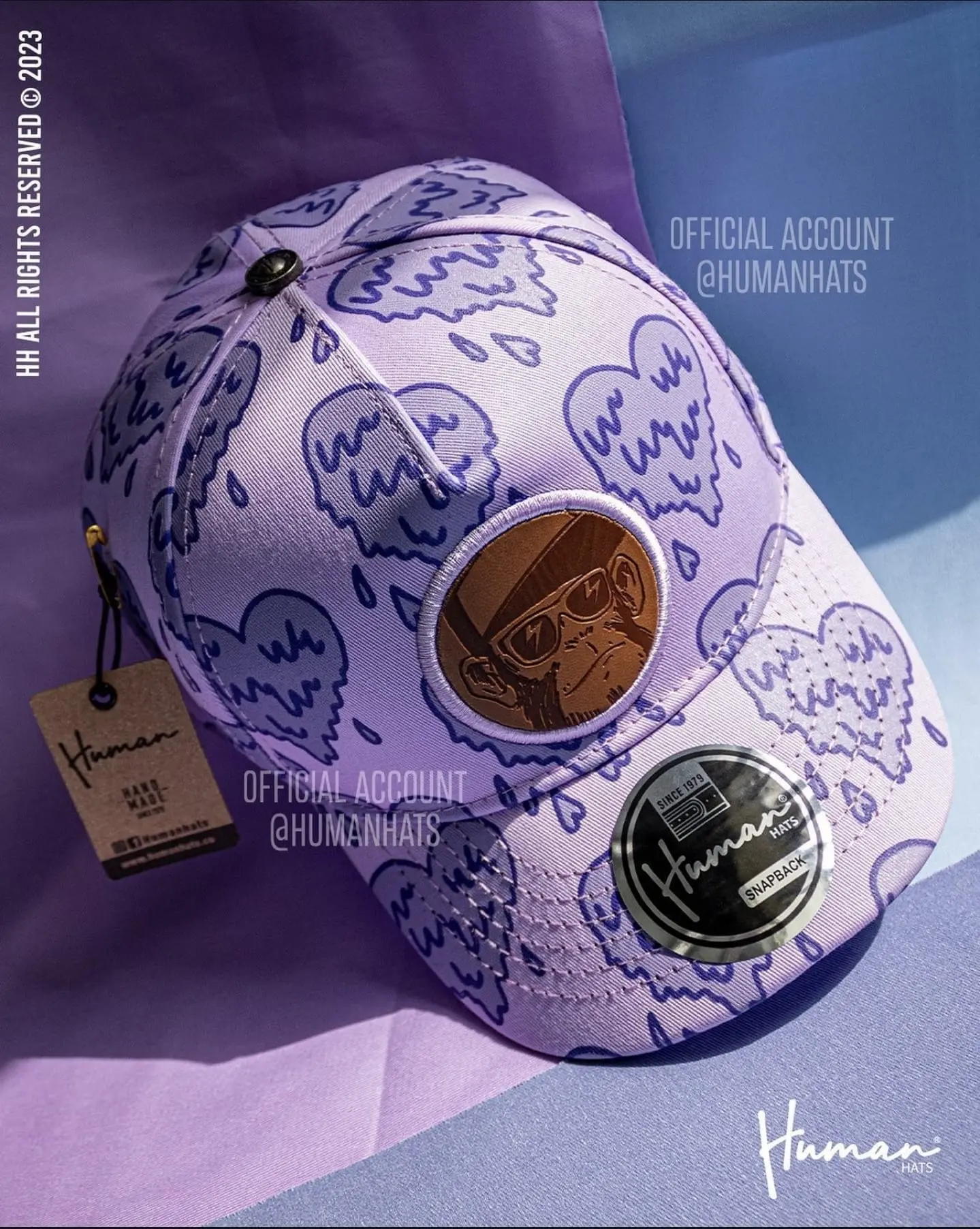 Human Hats Official Account Purple Cloud Pattern Snapback Hat with Monogram Patch and Brand Label