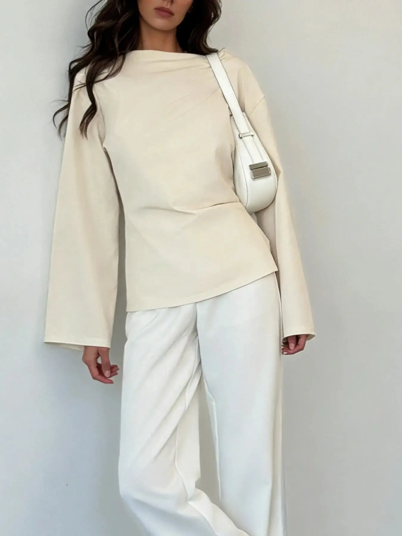 A women's light and mature style Casual Long Sleeve waist cinched shirt Blouse Top with a fashionable one collar design and flared sleeves for slimming and versatile commuting. Suitable for spring and autumn, home, indoor, and outdoor wear