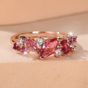 A rose gold round red corundum water drop ring made of synthetic red zirconia is suitable for women to wear daily at wedding parties