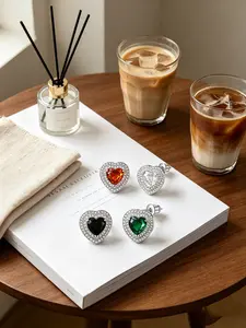 A pair of double-layer bezel-set heart zircon earrings, lightweight luxury with a high-end feel, hypoallergenic silver needle earrings