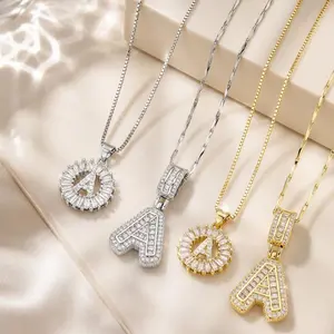 Light Luxury Sparkling Step-Cut Diamond Initial Necklace available in two designs: circular ring and thick version, a popular accessory in gold and silver two-tone finishes name quality