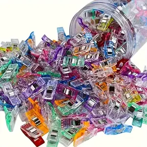 50-pack of sewing clips with stainless steel springs. Ideal for quilting, bookbinding, and craft projects.