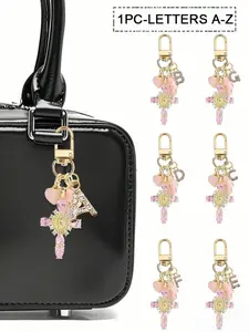 Christian charm keychain, Floral pattern keychain with a religious cross, amulet, and floral design - available with initials A-Z for wallets, backpacks, luggage, car key ornaments, making it a gift for friends, couples, parties