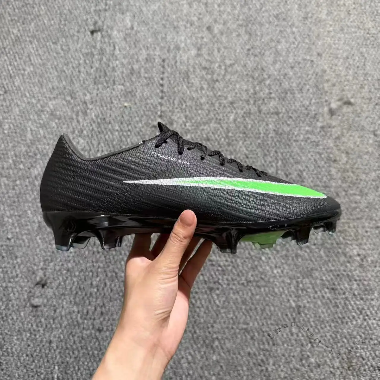 Neon Green Gradient Side Strip Solid Black Stretch Knit Low Top Firm Ground Soccer Cleats, Gloss Black Anti-Slip Stud Outsole Unisex Pro Footwear for Grass League Match Training