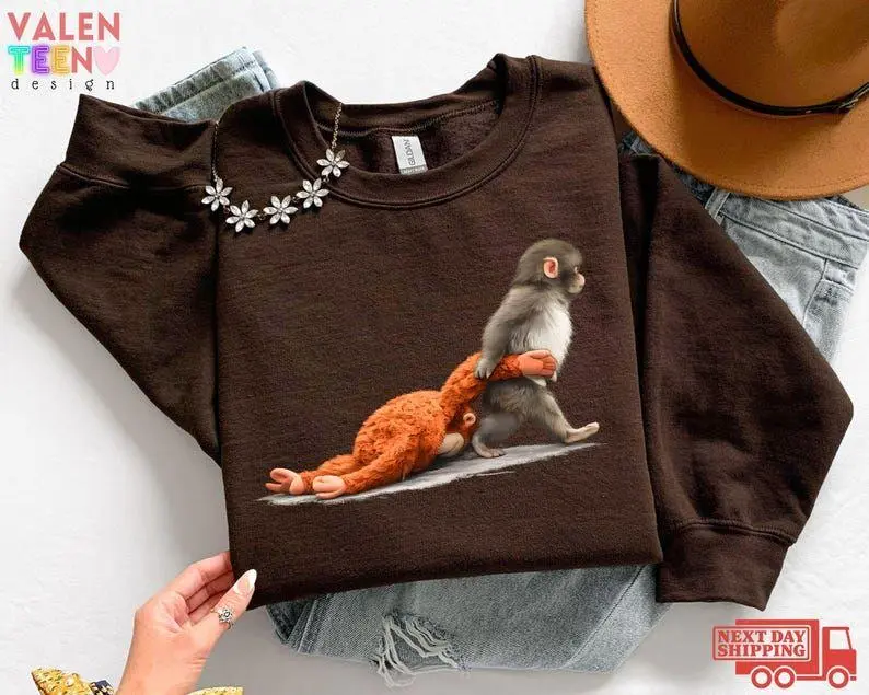 Women's Oversized Long Sleeve Solid Polyester Hoodie - Monkey Punch Graphic, Baby Monkey with Plush Toy, Smooth Ribbed Fabric, Animal Lover Gift, Cute Cozy Sweatshirt HFN, Cotton, Tops, Loose, Garment, Casual, Fit, Longsleeves, Full Sleeves