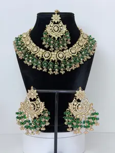 Bollywood Roshni Stonework Necklace Set with Earrings and Mangtika