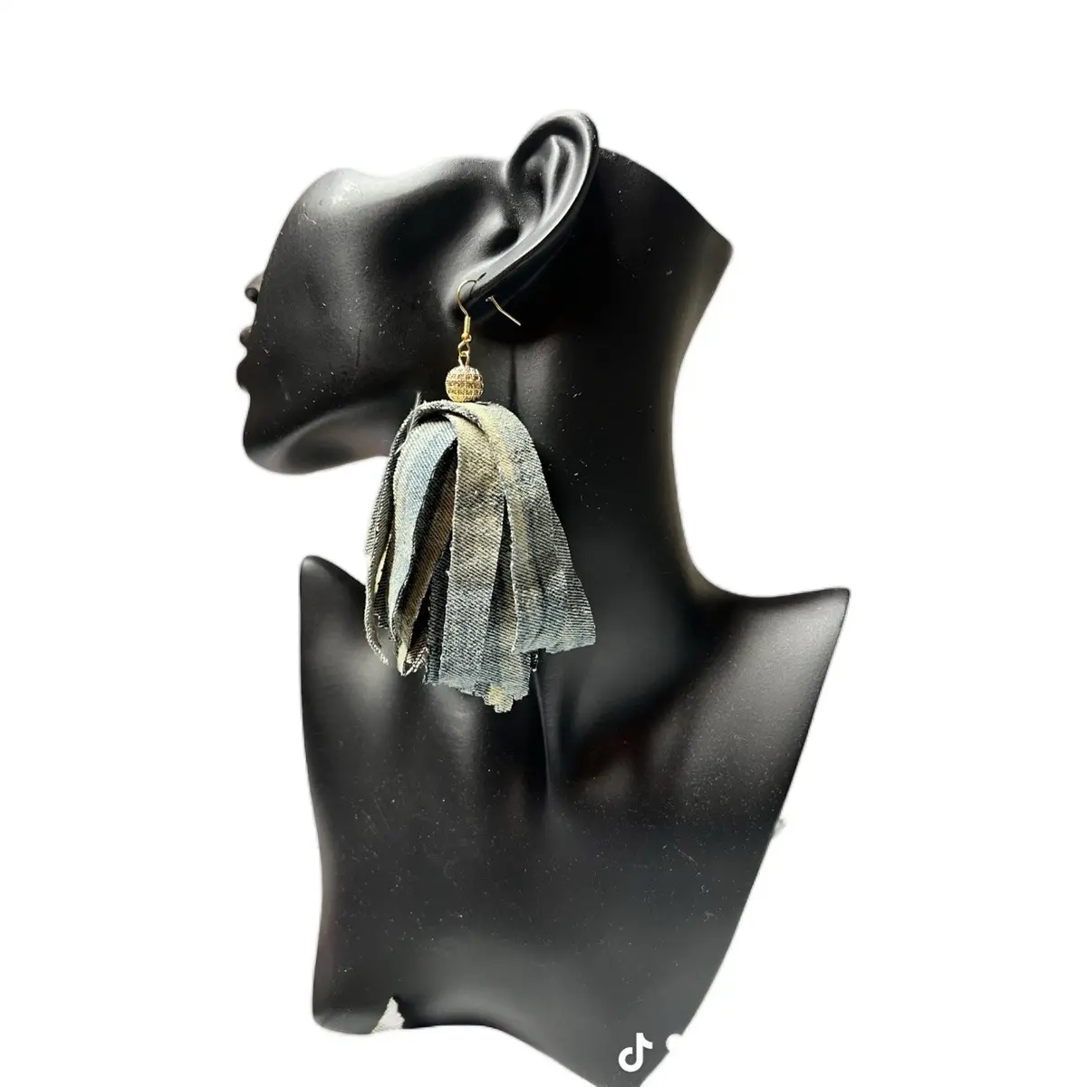 Frayed denim tassel with gold bead