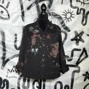 Handmade acid wash black jacket with hand-painted patchwork and lace panel backing