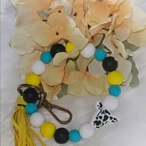 Teal Cow-Print Wristlet Keychain