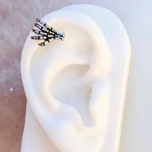Skull Hand Labret Stud. For Helix and Cartilage piercings.