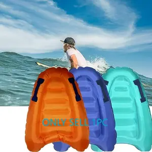 Inflatable Surfboard with Handle, Lightweight Foldable Design in Bright Cyan, Perfect for All Ages at Beach or Pond