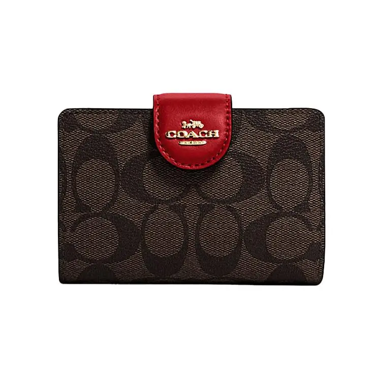 Coach Corner Zip Wristlet in Classic Monogram Coated Canvas with Leather Trim, Medium Size for Women in Red and Deep Brown