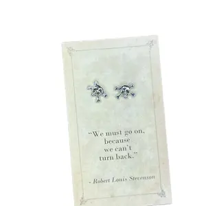 Charming Lane Boutique with literary quotes and matching earrings. We love these!