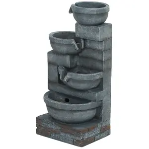 Staggered four bowl layered waterfall water feature with natural rustic outlook blends well with zen garden and countryside style outdoor landscape layouts