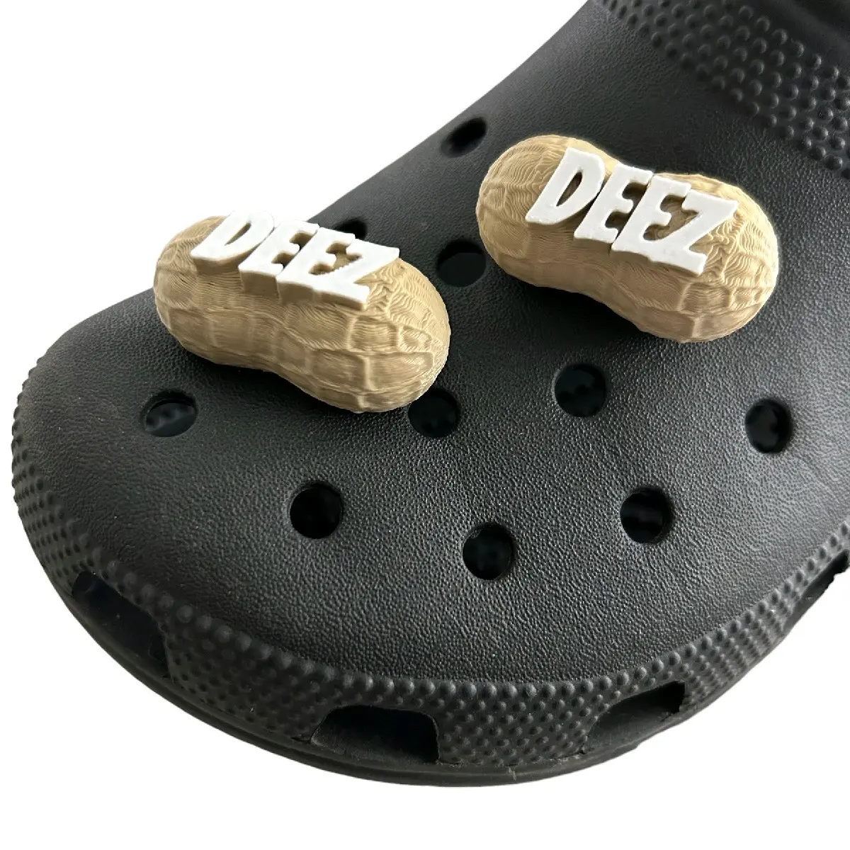 DEEZ NUTS funny clog charms 2 pack, Made in America,  universal fit for most size clog style shoes, unique patented design bold DEEZ lettering on a hard lightweight plastic peanut, simple push into clog style shoes. Footwear fashionable shoe