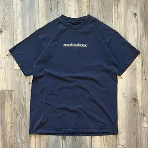 Quiksilvers Since 1970 Surf Logo Tee – Navy Blue Vintage