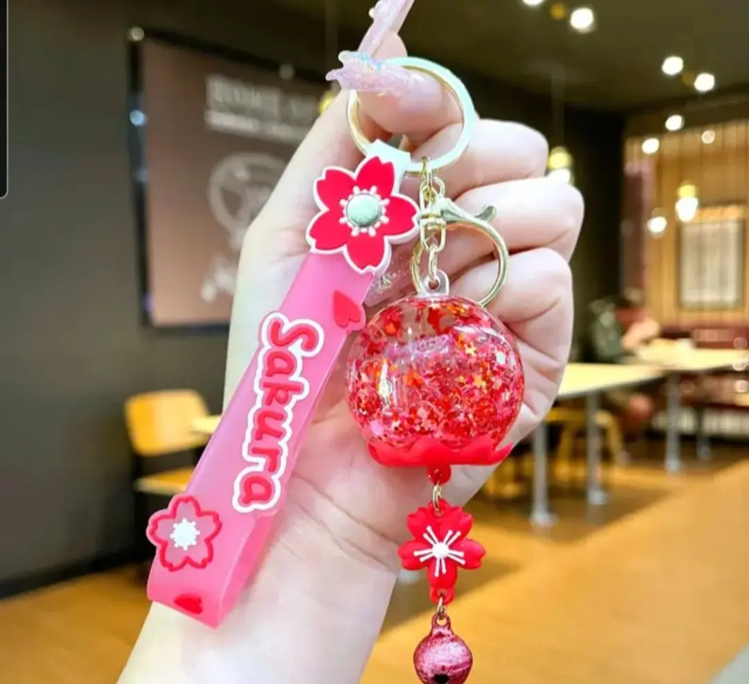 Sakura Keychain with Red Floral Design and Glittery Sphere for Stylish Accessory