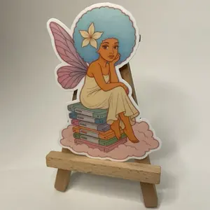 Nalen's World Cloud Archive Fairy Techno Sticker Afro Fairy Sitting on Vintage Drives Retro Digital Angel Aesthetic with Pink Wings and Blue Hair 3.5 x 2" Glossy Water-Resistant Vinyl