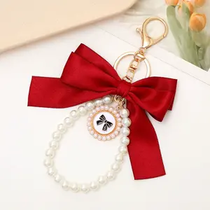 bow  keychain  Pearl Bow Keychain Wistlet for Girls Women Bow Pearl Keychains Pink Black Beige